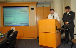 Photo of Dr. Richard Davey speaking at the podium